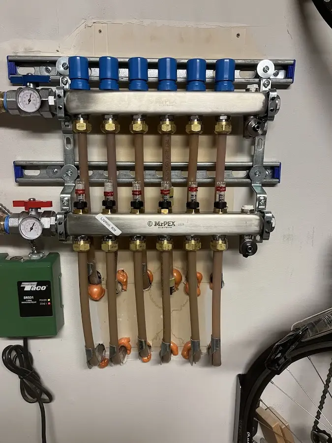 Plumber performing Water Heater Repair at a residential property in High Bridge